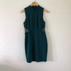 Macy’s emerald bodycon highneck homecoming dress